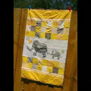 Handmade crib quilt with elephants
